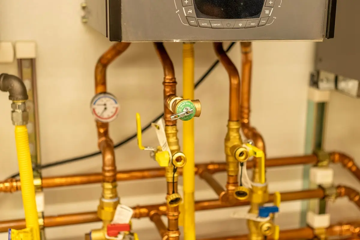 Licensed technician providing Water Heater Installation for a homeowner in Centreville